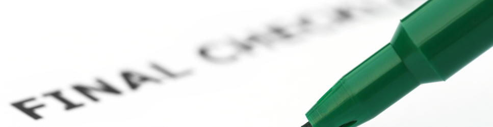 Image of a pen checking boxes for the Final Certificate