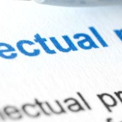 Changes to IP Law - Intellectual property printed on paper image
