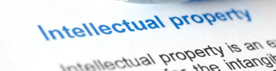 Changes to IP Law - Intellectual property printed on paper image