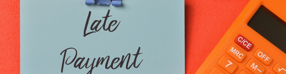 Late Payment sticky note and calculator