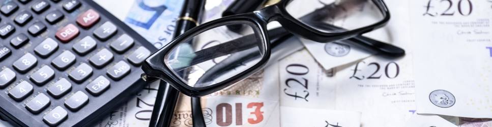 image of money and a calculator