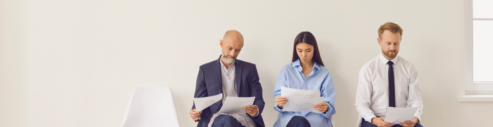 Image of people waiting for interview for Important things to consider when hiring