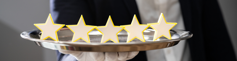 Image of 5* being served on a silver platter