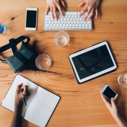 Image of lots of pieces of technology and electronics which can impact a directors duties