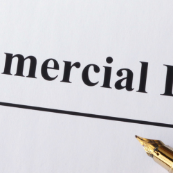Image of a Commercial Litigation page title and fountain pen