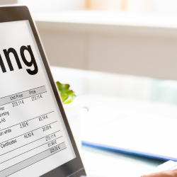 Image of a laptop with e-invoicing on screen