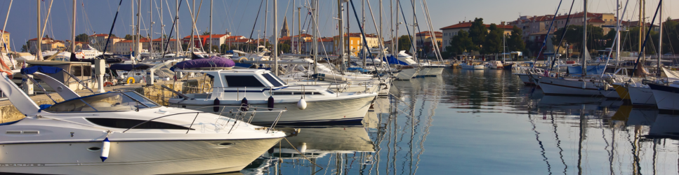 Image of boats in a marina for article header image