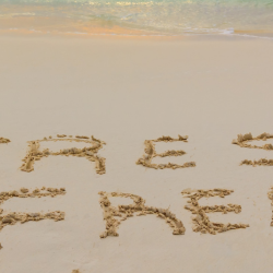 Stress Free written in sand for article header image