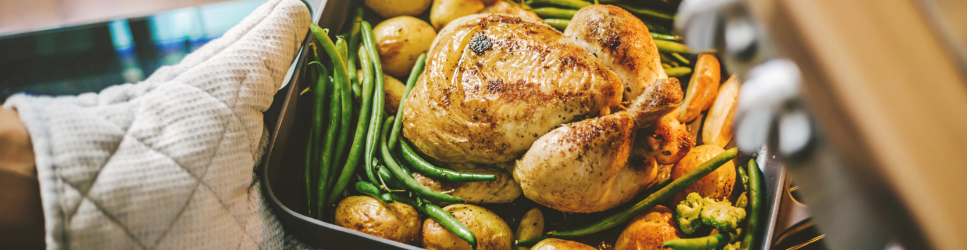 Image of a chicken coming out the oven