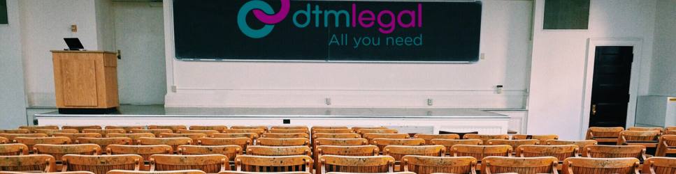 DTM Legal Logo on blackboard in a lecture theatre - Step into Law Event