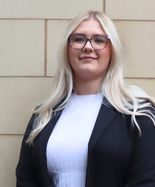 Megan George, Paralegal in Commercial Property photographed outside DTM Legal Chester