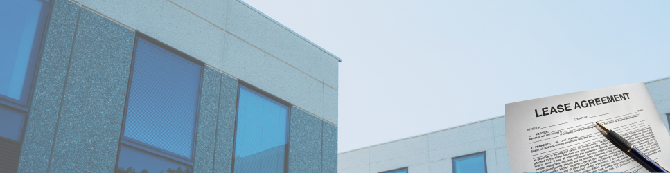 Image of commercial property and a lease agreement for commercial lease review warning article.