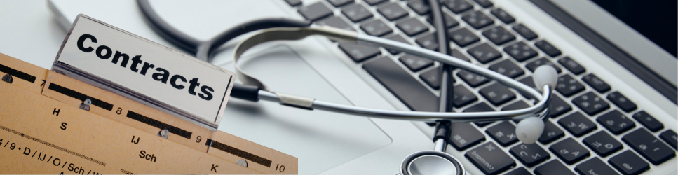 Image of contracts and a stethoscope with a laptop for Healthcare sector header image