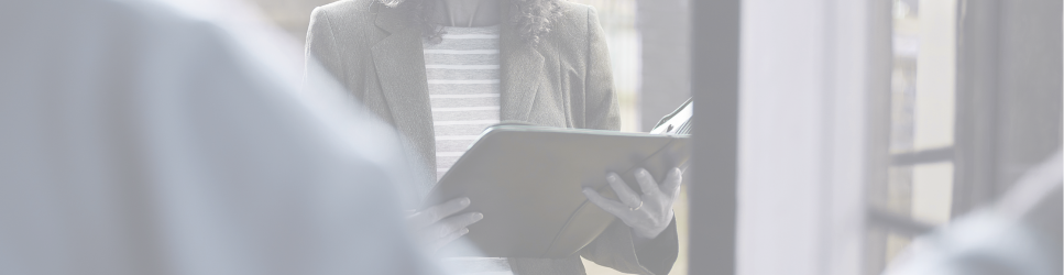 Image of a tenant opening a door for a landlord.