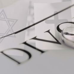 Image of symbols of faith with divorce documents and a ring