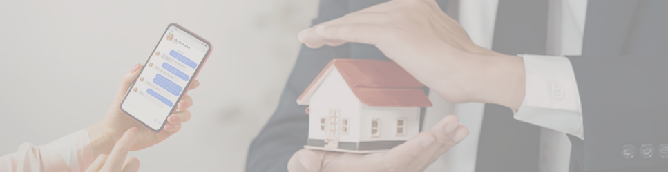 Image of someone holding a property and a mobile phone