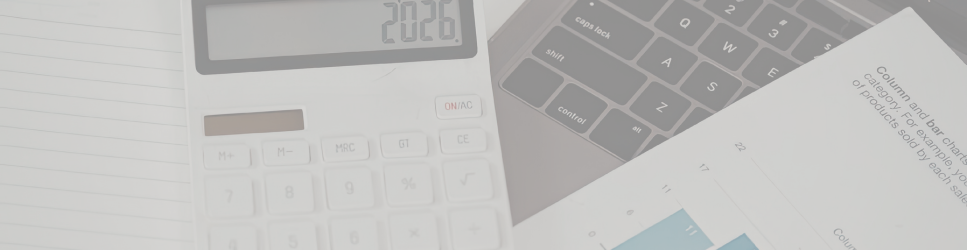 Calculator, Laptop and bar graphs image