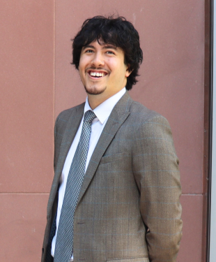 Tom Clarkson, Junior Paralegal in Commercial Property photographed outside DTM Legal Liverpool office.