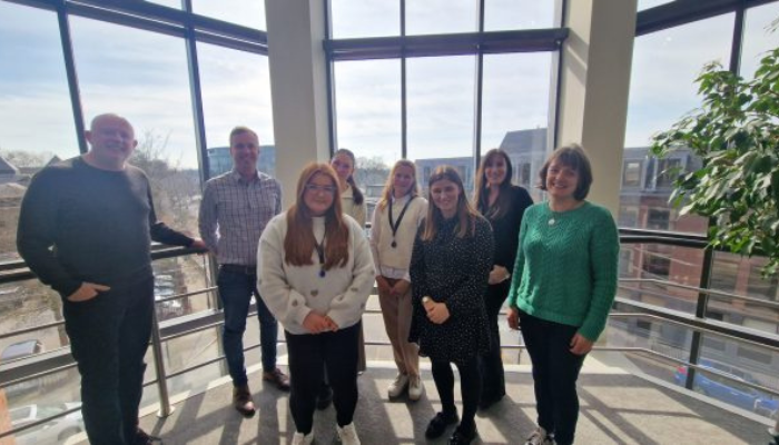 Photo of the DTM Legal ESG Committee in the Chester Office.