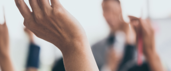 Hands up Image for How your vote can impact business article