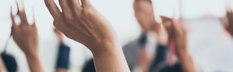 Hands up Image for How your vote can impact business article